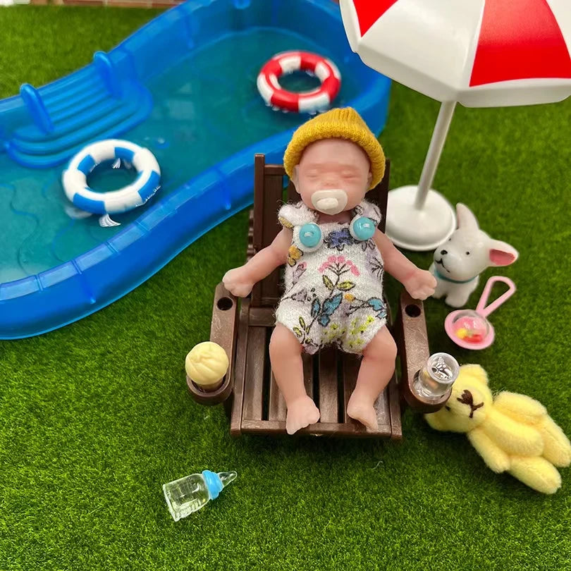 8Cm Cute Mini Silicone Bebe Reborn Girl with 2 Sets Mini Outfits for Each Reborn Baby Girl Soft Touching Feeling Flexible Doll