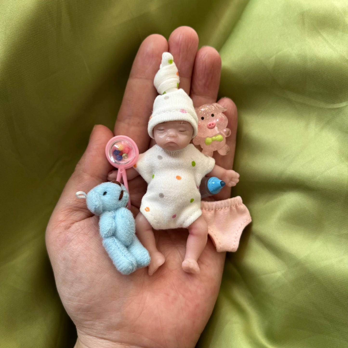 8Cm Cute Mini Silicone Bebe Reborn Girl with 2 Sets Mini Outfits for Each Reborn Baby Girl Soft Touching Feeling Flexible Doll