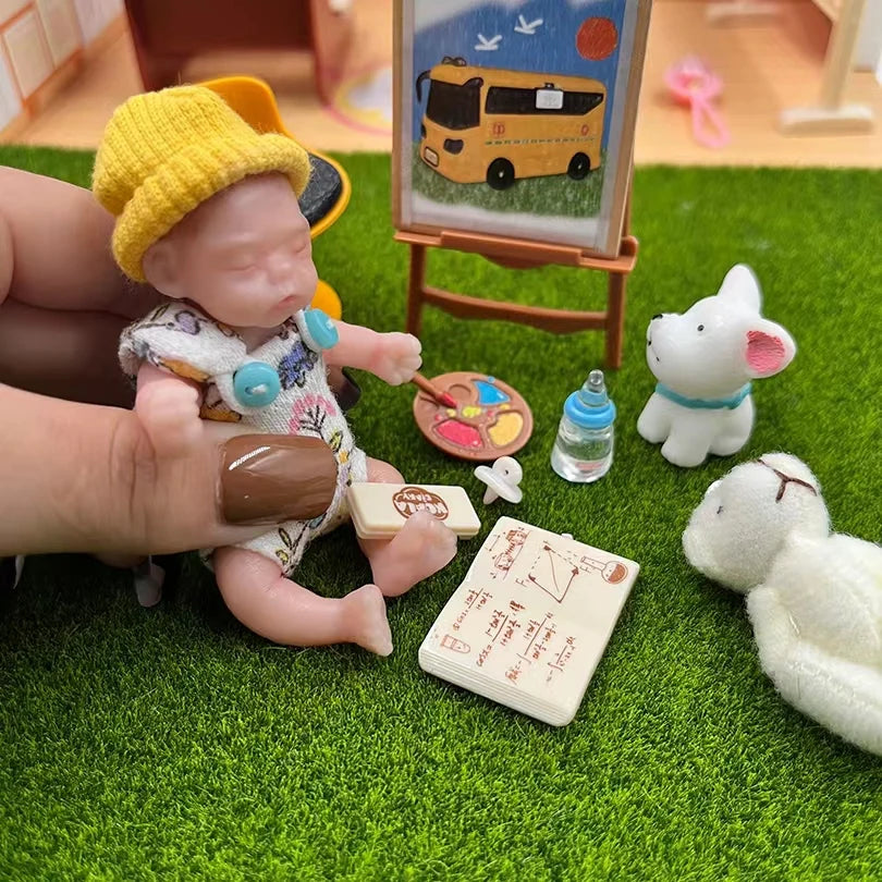 8Cm Cute Mini Silicone Bebe Reborn Girl with 2 Sets Mini Outfits for Each Reborn Baby Girl Soft Touching Feeling Flexible Doll