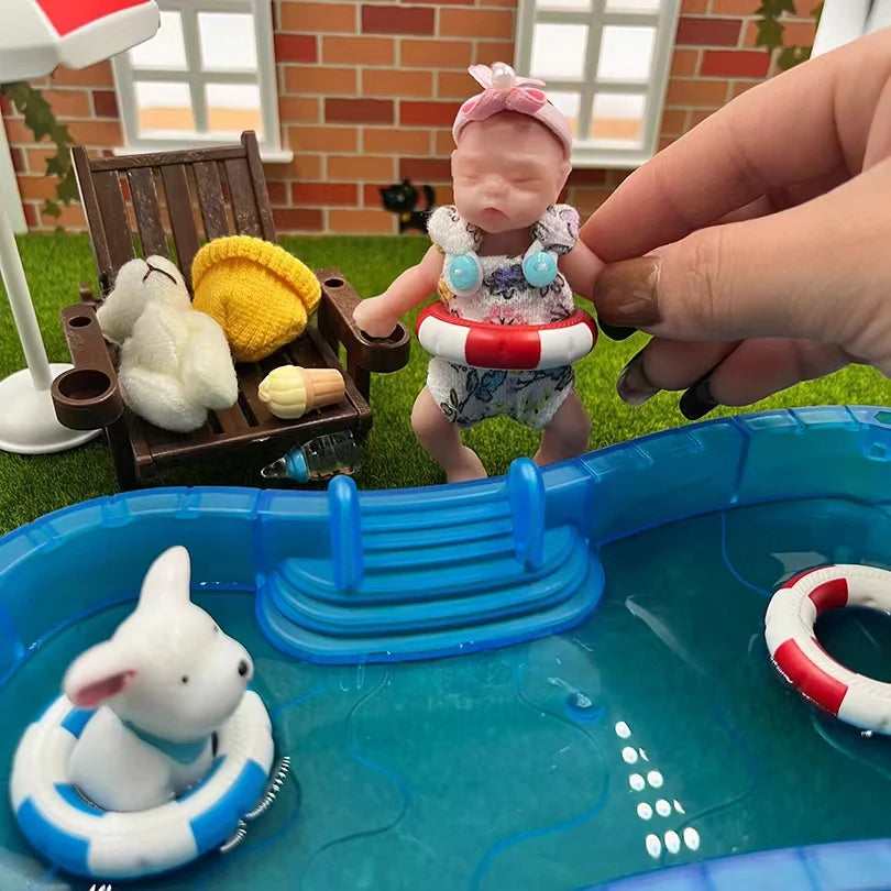 8Cm Cute Mini Silicone Bebe Reborn Girl with 2 Sets Mini Outfits for Each Reborn Baby Girl Soft Touching Feeling Flexible Doll