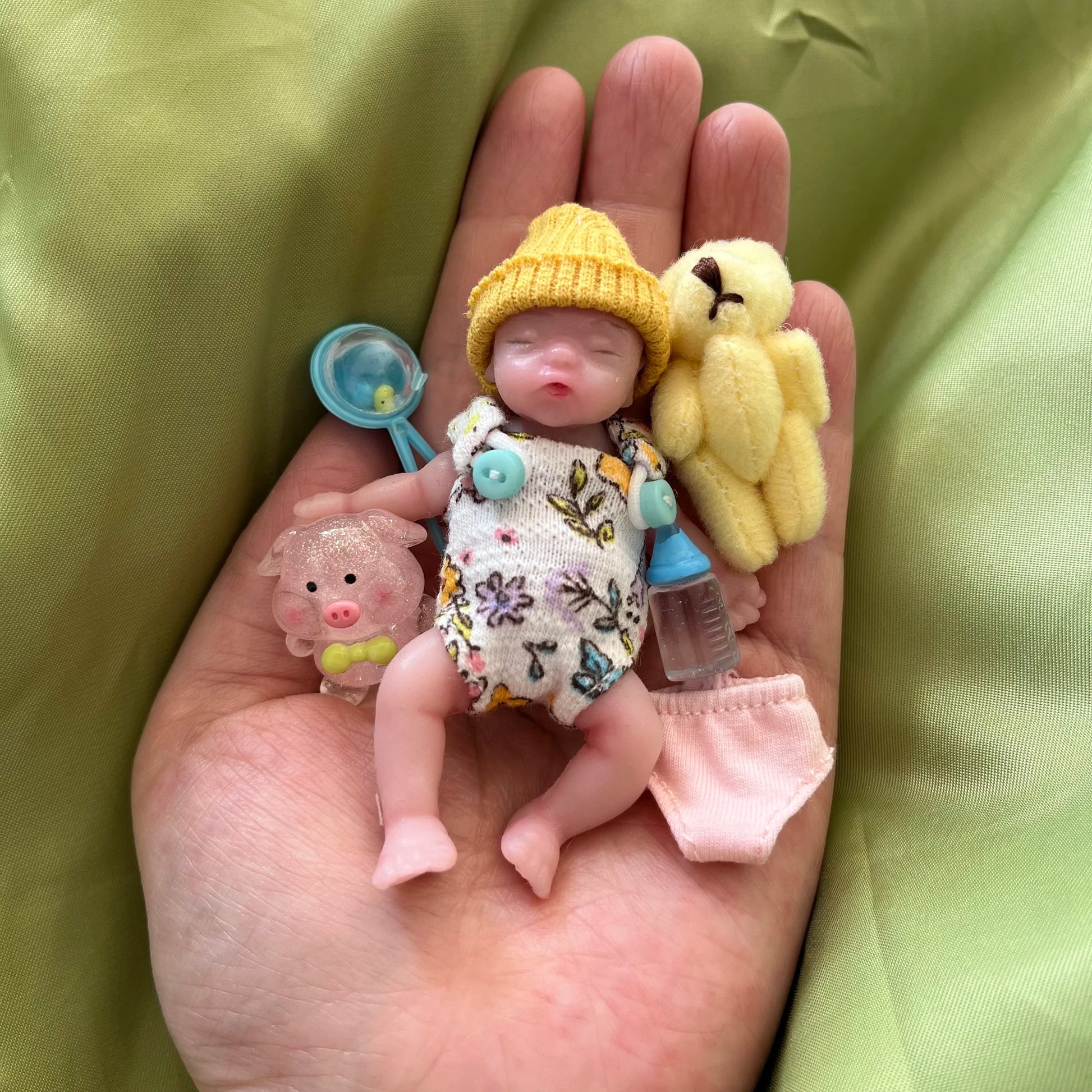 8Cm Cute Mini Silicone Bebe Reborn Girl with 2 Sets Mini Outfits for Each Reborn Baby Girl Soft Touching Feeling Flexible Doll